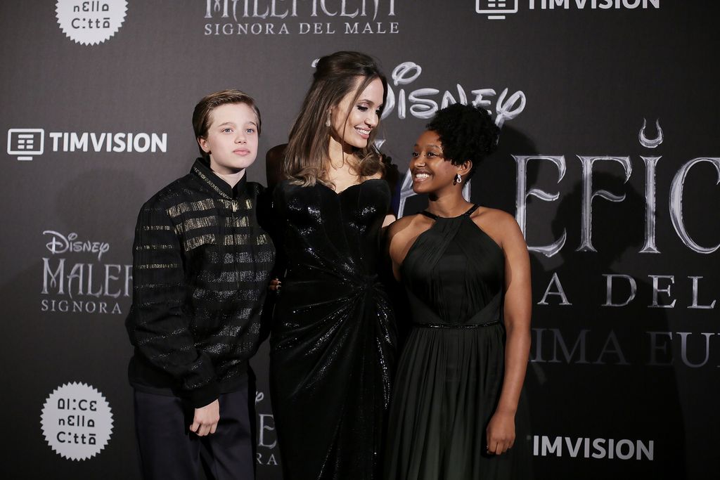 ROME, ITALY - OCTOBER 07: (L-R) Shiloh Nouvel Jolie-Pitt, Angelina Jolie and Zahara Marley Jolie-Pitt attend the European premiere of the movie 