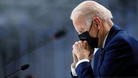 Momen Biden memejamkan matanya ini terlihat saat pembukaan Konferensi Perubahan Iklim PBB itu. Ia tertidur dengan posisi duduk. AP Photo/Erin Schaff