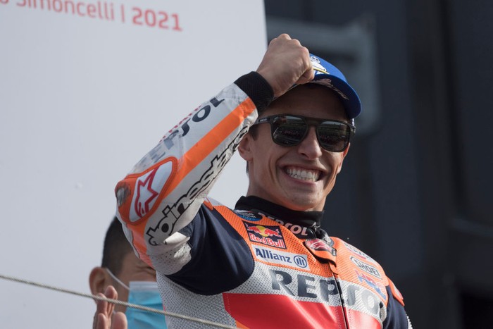 MISANO ADRIATICO, ITALY - OCTOBER 24: Marc Marquez of Spain and Repsol Honda Team celebrates the victory on the podium at the end of the MotoGP race during the MotoGP of Emilia Romagna - Race at Misano World Circuit on October 24, 2021 in Misano Adriatico, Italy. (Photo by Mirco Lazzari gp/Getty Images)