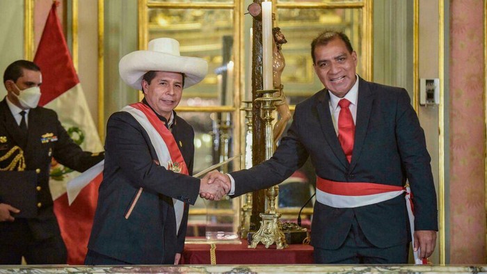 Perus President Pedro Castillo (L) appointed interior minister Luis Barranzuela during a ceremony in Lima last month - (PRESIDENCIA DEL PERU/AFP)