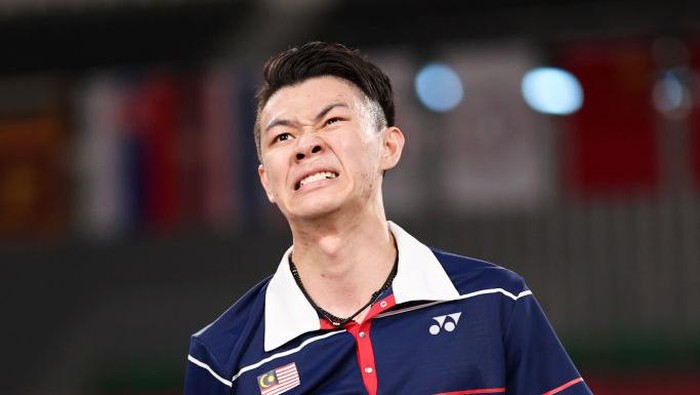 CHOFU, JAPAN - JULY 29: Lee Zii Jia of Team Malaysia reacts as he competes against Chen Long of Team China during a Mens Singles Round of 16 match on day six of the Tokyo 2020 Olympic Games at Musashino Forest Sport Plaza on July 29, 2021 in Chofu, Tokyo, Japan. (Photo by Lintao Zhang/Getty Images)