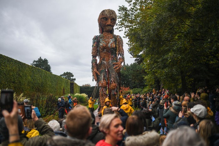 EDINBURGH, SCOTLAND - OCTOBER 30: Storm, a ten metre tall puppet made from recycled materials, is seen at the Royal Botanic Gardens on October 30, 2021 in Edinburgh, Scotland. At ten metres tall Storm is Scotland's largest puppet. She is made entirely from recycled materials and is operated by a crew of ten puppeteers. Storm was created by Vision Mechanics and has been touring the country encouraging people to celebrate the seas, care for the coastlines and empower us all to put the environment first. Today's appearance coincides with the build-up of the COP26 Climate summit that begins tomorrow (Sunday) in Glasgow. (Photo by Peter Summers/Getty Images)
