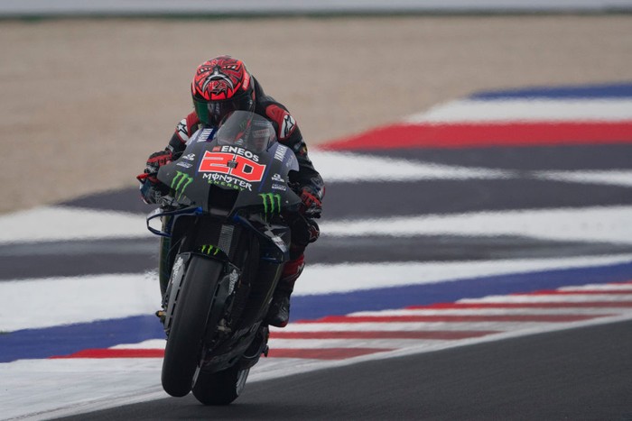 MISANO ADRIATICO, ITALY - OCTOBER 23:  Fabio Quartararo of France and Monster Energy Yamaha MotoGP Team lifts the front wheel during the MotoGP of Emilia Romagna - Qualifying at Misano World Circuit on October 23, 2021 in Misano Adriatico, Italy.  (Photo by Mirco Lazzari gp/Getty Images)