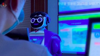 Dalam rekaman yang disiarkan oleh televisi pemerintah Korea Utara KRT, ditampilkan robot bermata biru, berbendera Korea Utara di dadanya, berkeliaran di sekitar ruang kelas di sebuah sekolah di Pyongyang. Foto: Reuters 