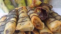 Kalau mau camilan pisang yang renyah, lumpia pisang ini jadi pilihan pas. Memakai kulit lumpia goreng yang diisi potongan pisang kepok dan meises cokelat hingga keju cheddar parut. Membuatnya gampang, tinggal ikuti saja resep ini. Foto: Eva Sri Astuti