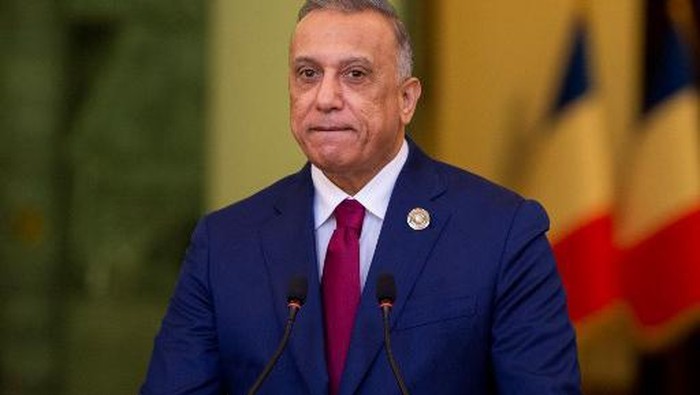 (FILES) In this file photo taken on August 28, 2021, Iraqi Prime Minister Mustafa al-Kadhemi speaks during a joint press conference with the French President at the Prime Ministers office in the Iraqi capital Baghdad. - Iraqs Prime Minister Mustafa al-Kadhemi said he was 