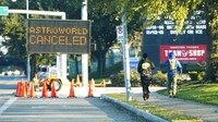 Insiden tersebut membuat gelaran festival musik Astroworld dihentikan. Pengumuman terkait dihentikannya festival musik tersebut terlihat di kawasan NRG Park, Sabtu (6/11) waktu setempat. Elizabeth Conley/Houston Chronicle via AP.