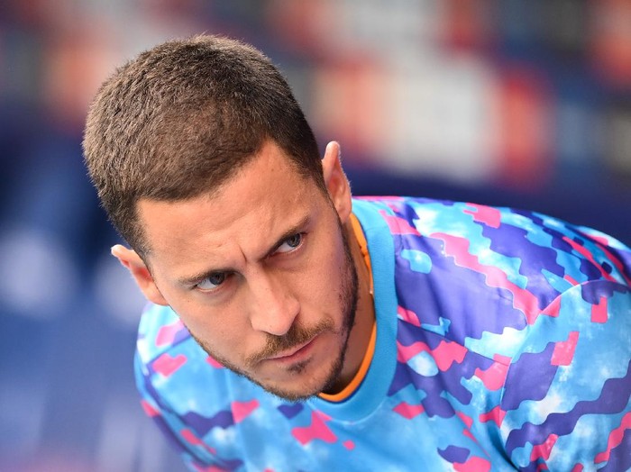 BARCELONA, SPAIN - OCTOBER 03: Eden Hazard of Real Madrid CF looks on during the La Liga Santander match between RCD Espanyol and Real Madrid CF at RCDE Stadium on October 03, 2021 in Barcelona, Spain. (Photo by David Ramos/Getty Images)