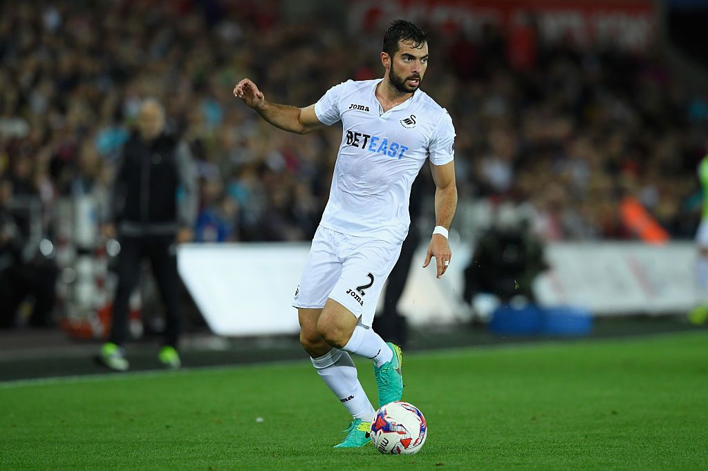SWANSEA, WALES - SEPTEMBER 21:  Jordi Amat of Swansea in action during the EFL Cup Third Round match between Swansea City and Manchester City at the Liberty Stadium on September 21, 2016 in Swansea, Wales.  (Photo by Stu Forster/Getty Images)