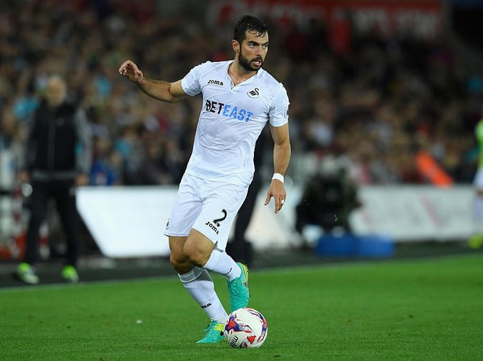 SWANSEA, WALES - SEPTEMBER 21:  Jordi Amat of Swansea in action during the EFL Cup Third Round match between Swansea City and Manchester City at the Liberty Stadium on September 21, 2016 in Swansea, Wales.  (Photo by Stu Forster/Getty Images)