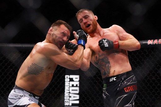NEW YORK, NEW YORK - NOVEMBER 06: Justin Gaethje is slammed to the mat by Michael Chandler in their lightweight bout during the UFC 268 event at Madison Square Garden on November 06, 2021 in New York City.   Mike Stobe/Getty Images/AFP (Photo by Mike Stobe / GETTY IMAGES NORTH AMERICA / Getty Images via AFP)