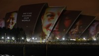 Kampanye #ProjectingChange ini adalah aktivasi seni yang dibuat oleh seniman terkenal dunia yang dimaksudkan untuk menginspirasi harapan seputar krisis iklim.  Foto: Getty Images for #ProjectingChan/Jeremy Sutton-Hibbert