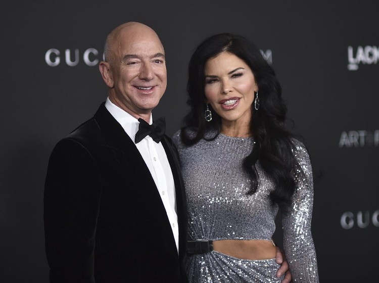 Jeff Bezos, left, and Lauren Sanchez arrive at the LACMA Art + Film Gala on Saturday, Nov. 6, 2021, at the Los Angeles County Museum of Art in Los Angeles. (Photo by Richard Shotwell/Invision/AP)