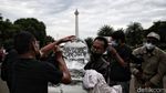 Aksi Patung Es Greenpeace untuk Jokowi