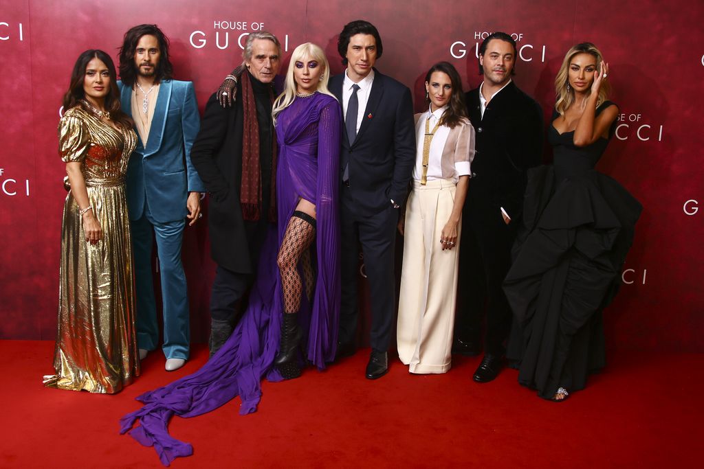 Lady Gaga, from right, Adam Driver, Jared Leto and Salma Hayek pose for photographers upon arrival at the World premiere of the film 'House of Gucci' in London Tuesday, Nov. 9, 2021. (Photo by Vianney Le Caer/Invision/AP)