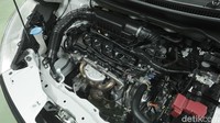 Suzuki All New Ertiga Suzuki Sport FF ini masih menggunakan mesin yang sama dengan Ertiga lainnya baik tipe GA, GL, hingga GX. Mesinnya adalah mesin berkode K15B, DOHC, dengan konfigurasi 4 silinder dan 16 katup. Di atas kertas, mesin Ertiga punya kapasitas 1.462 cc. (Muhammad Hafizh Gemilang/detikoto)
