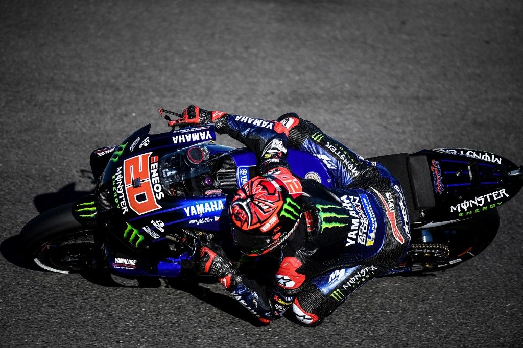 Monster Energy Yamaha MotoGP's French rider Fabio Quartararo rides during the morning warm up session ahead of the MotoGP race of the Portuguese Grand Prix at the Algarve International Circuit in Portimao, on November 7, 2021. (Photo by PATRICIA DE MELO MOREIRA / AFP)