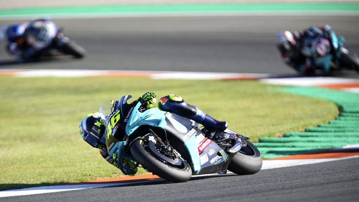 MotoGP rider Valentino Rossi of Italy steers his motorcycle during the Valencia Motorcycle Grand Prix, the last race of the season, at the Ricardo Tormo circuit in Cheste, near Valencia, Spain, Sunday, Nov. 14, 2021. (AP Photo/Alberto Saiz)