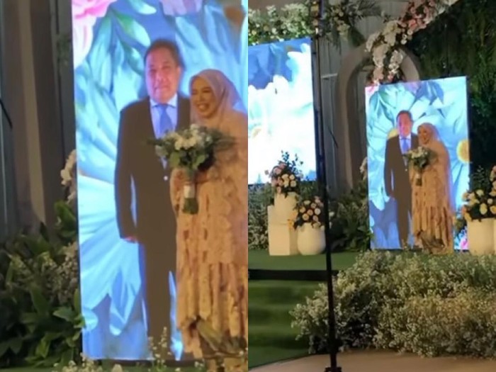 Kisah pengantin viral yang menikah virtual dengan mempelai pria. Kisah pengantin viral yang menikah virtual dengan mempelai pria.