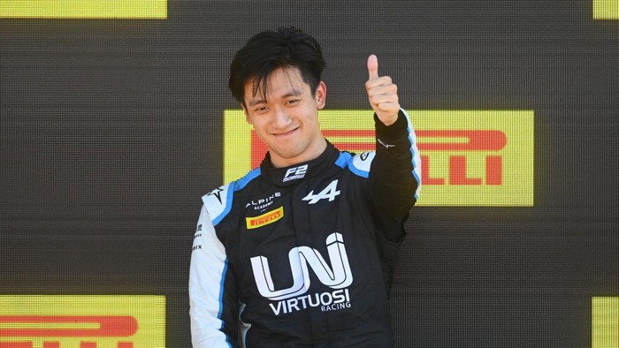 NORTHAMPTON, ENGLAND - JULY 18: Race winner Guanyu Zhou of China and UNI-Virtuosi Racing celebrates on the podium during the Round 4:Silverstone feature race of the Formula 2 Championship at Silverstone on July 18, 2021 in Northampton, England. (Photo by Michael Regan/Getty Images)