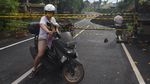 Jalan Raya Gianyar Bali Ambles Imbas Hujan Deras