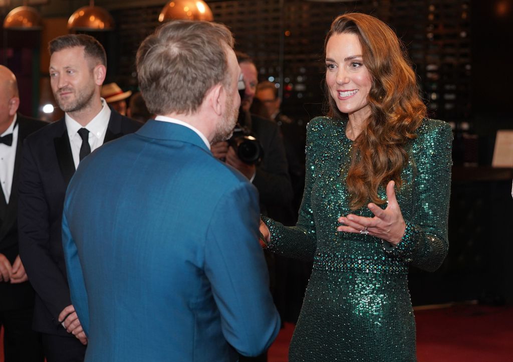 Britain's Kate, The Duchess of Cambridge, speaks to Chris McCausland after the Royal Variety Performance at the Royal Albert Hall, in London, Thursday, Nov. 18, 2021. (Jonathan Brady/Pool Photo via AP)
