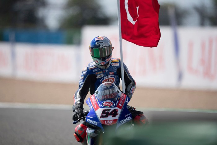 MAGNY-COURS, FRANCE - SEPTEMBER 05: Toprak Razgatlioglu of Turkey and Pata Yamaha with Brixx WorldSBK celebrates the victory with the flag during the WorldSBK race 2 during the WorldSBK France - Race 2 at Nevers Magny-Cours Circuit on September 05, 2021 in Magny-Cours, France. (Photo by Mirco Lazzari gp/Getty Images)