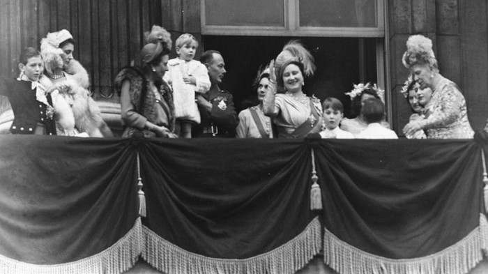 568963227 Members of the Royal Family on the balcony following the wedding of Princess Elizabeth and Philip Mountbatten; (L-R) Duke of Kent, Duchess of Kent, Princess Andrew of Greece, Duke of Gloucester holding Prince Richard, Duchess of Gloucester, Queen Elizabeth, Prince William of Gloucester, Prince Michael of Kent, Princess Elizabeth and Queen Mary, at Buckingham Palace, London, November 20th 1947. (Photo by Hulton Archive/Getty Images)