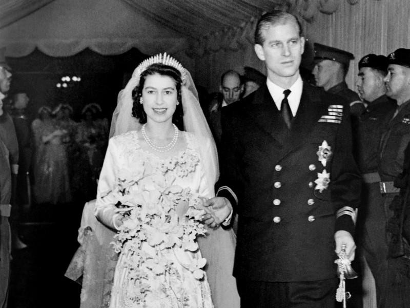 Princess Elizabeth of England and Prince Philip are seen on their wedding day 20th November 1947, in London. (Photo by CENTRAL PRESS / AFP)