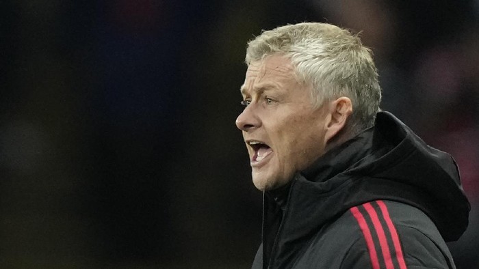 Manchester Uniteds manager Ole Gunnar Solskjaer gives instructions to his players during the English Premier League soccer match between Watford and Manchester United at Vicarage Road, Watford, England, Saturday, Nov. 20, 2021. (AP Photo/Frank Augstein)