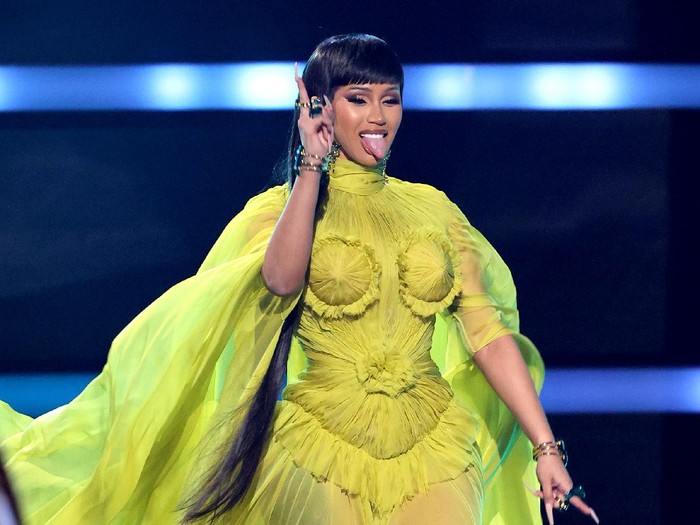 LOS ANGELES, CALIFORNIA - NOVEMBER 21: Host Cardi B speaks onstage during the 2021 American Music Awards at Microsoft Theater on November 21, 2021 in Los Angeles, California. (Photo by Kevin Winter/Getty Images for MRC)