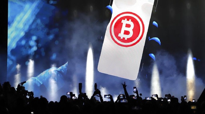 El Salvadors President Nayib Bukele participates in the closing ceremony of a congress for cryptocurrency investors in Santa Maria Mizata, El Salvador, Saturday, Nov. 20, 2021. Bukele announced during the rock concert-like atmosphere at the gathering that his government will build an oceanside 