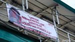 Spanduk Stop Kasus Formula E Mejeng di Tanah Abang