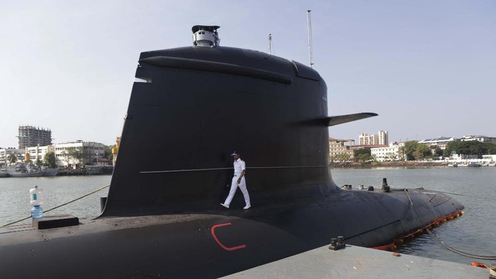 An INS Vela submarine is prepared before its commissioning in Mumbai, India, Tuesday, Nov. 23, 2021. Th submarine will be commissioned on Nov. 25. (AP Photo/Rajanish kakade)