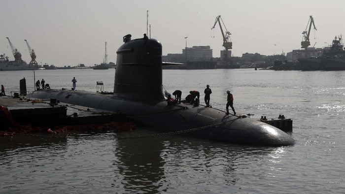 An INS Vela submarine is prepared before its commissioning in Mumbai, India, Tuesday, Nov. 23, 2021. Th submarine will be commissioned on Nov. 25. (AP Photo/Rajanish kakade)