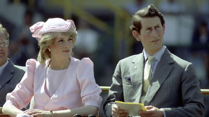 NEWCASTLE, AUSTRALIA - 1983: Princess Diana And Prince Charles watch an official event during their first royal Australian tour 1983 IN Newcastle, Austrlia. (Photo by Patrick Riviere/Getty Images)