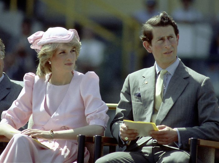 NEWCASTLE, AUSTRALIA - 1983: Princess Diana And Prince Charles watch an official event during their first royal Australian tour 1983 IN Newcastle, Austrlia. (Photo by Patrick Riviere/Getty Images)