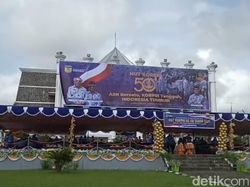 Waduh! Bendera Merah Putih Terbalik di Baliho HUT Korpri Mimika