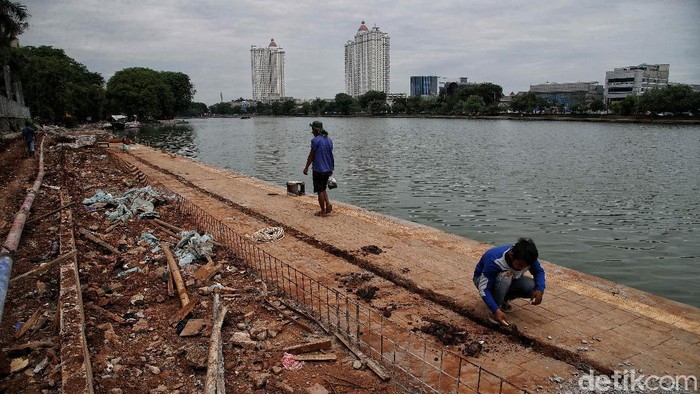 Menanti Wajah Baru Danau Sunter Usai Direvitalisasi Proyek revitalisasi Danau Sunter masih terus berlangsung. Saat ini pengerjaan masih berfokus pada pengecoran dan jogging track. Berikut penampakannya.