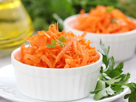 Salad with fresh carrot and oil