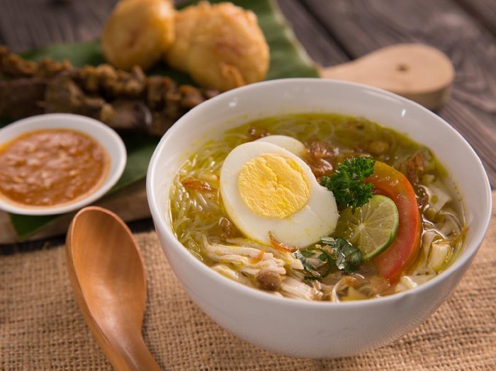 soto ayam. shreedded chicken soup with egg. indonesian food