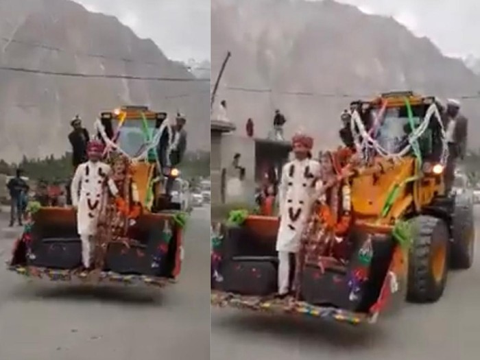 Viral pasangan pengantin yang diarak menggunakan bulldozer. Viral pasangan pengantin yang diarak menggunakan bulldozer.