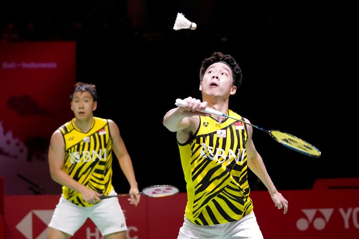 Indonesias Kevin Sanjaya Sukamuljo, left, and Marcus Gideon compete against Taiwans Lee Yang and Wang Chi Lin compete during their mens doubles Group A badminton match at the BWF World Tour Finals in Nusa Dua, Bali, Indonesia, Wednesday, Dec. 1, 2021. (AP Photo/Dita Alangkara)