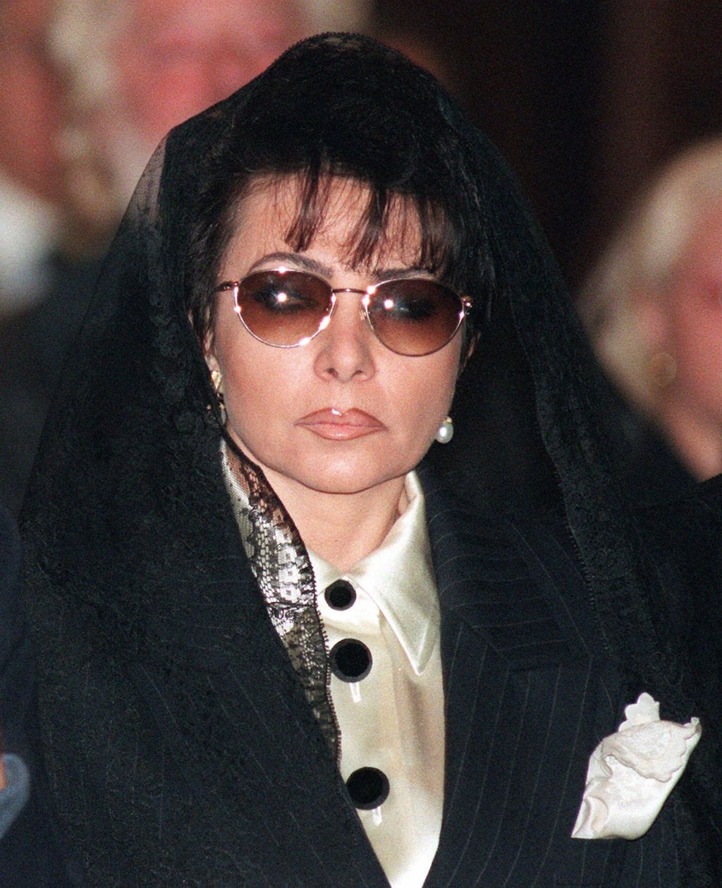 ** FILE ** Patrizia Reggiani Martinelli, 49, is shown at the funeral of her former husband, Maurizio Gucci, in Milan, in this April 3, 1995 file photo. Italy's top court on Wednesday, Jan. 25, 2006 rejected a request by slain fashion heir Maurizio Gucci's ex-wife to serve the rest of her prison term for his 1995 murder under house arrest. Patrizia Reggiani Martinelli cited health problems in her request, said lawyer Danilo Buongiorno. He said the woman suffered brain damage during surgery for a brain tumor years ago and also suffers from epilepsy. (AP Photo/Luca Bruno/files)