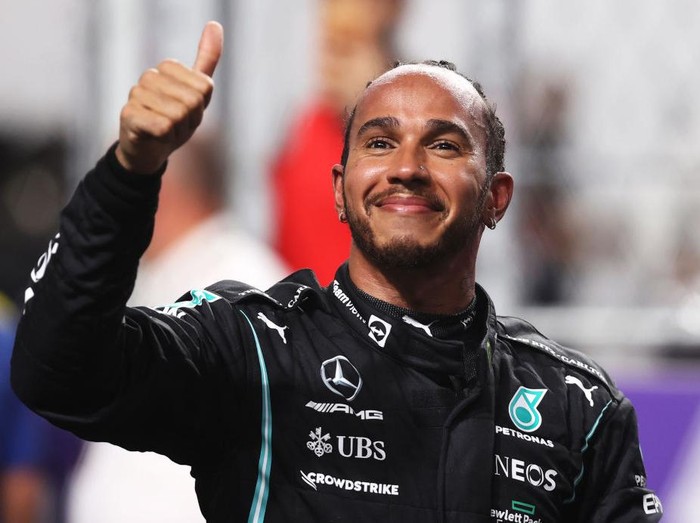 JEDDAH, SAUDI ARABIA - DECEMBER 04: Pole position qualifier Lewis Hamilton of Great Britain and Mercedes GP celebrates in parc ferme during qualifying ahead of the F1 Grand Prix of Saudi Arabia at Jeddah Corniche Circuit on December 04, 2021 in Jeddah, Saudi Arabia. (Photo by Lars Baron/Getty Images)