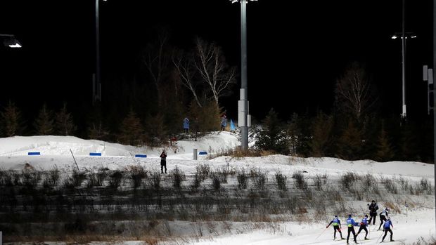 Nordic Skiing - Beijing 2022 Winter Olympics Test Event - FIS Nordic Combined Continental Cup - National Cross-Country Skiing Centre, Zhangjiakou, Hebei, China - December 4, 2021. Athletes ski before the men's nordic combined cross country skiing  REUTERS/Tingshu Wang.
