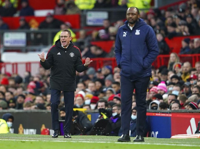 Manchester United's manager Ralf Rangnick, left, reacts during the English Premier League soccer match between Manchester United and Crystal Palace at Old Trafford stadium in Manchester, England, Sunday, Dec. 5, 2021. (AP Photo/Jon Super)
