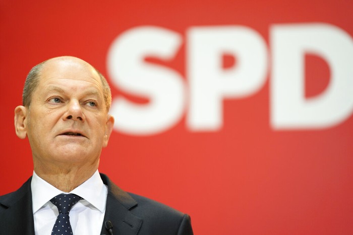 Designated new German chancellor Olaf Scholz presents the ministers of his Social Democratic Party, SPD, for the new German government during a news conference at the party's headquarters in Berlin, Germany, Monday, Dec. 6, 2021. German parliament Bundestag is planning to elect Scholz as new chancellor on Wednesday Dec. 8, 2021. (AP Photo/Markus Schreiber)