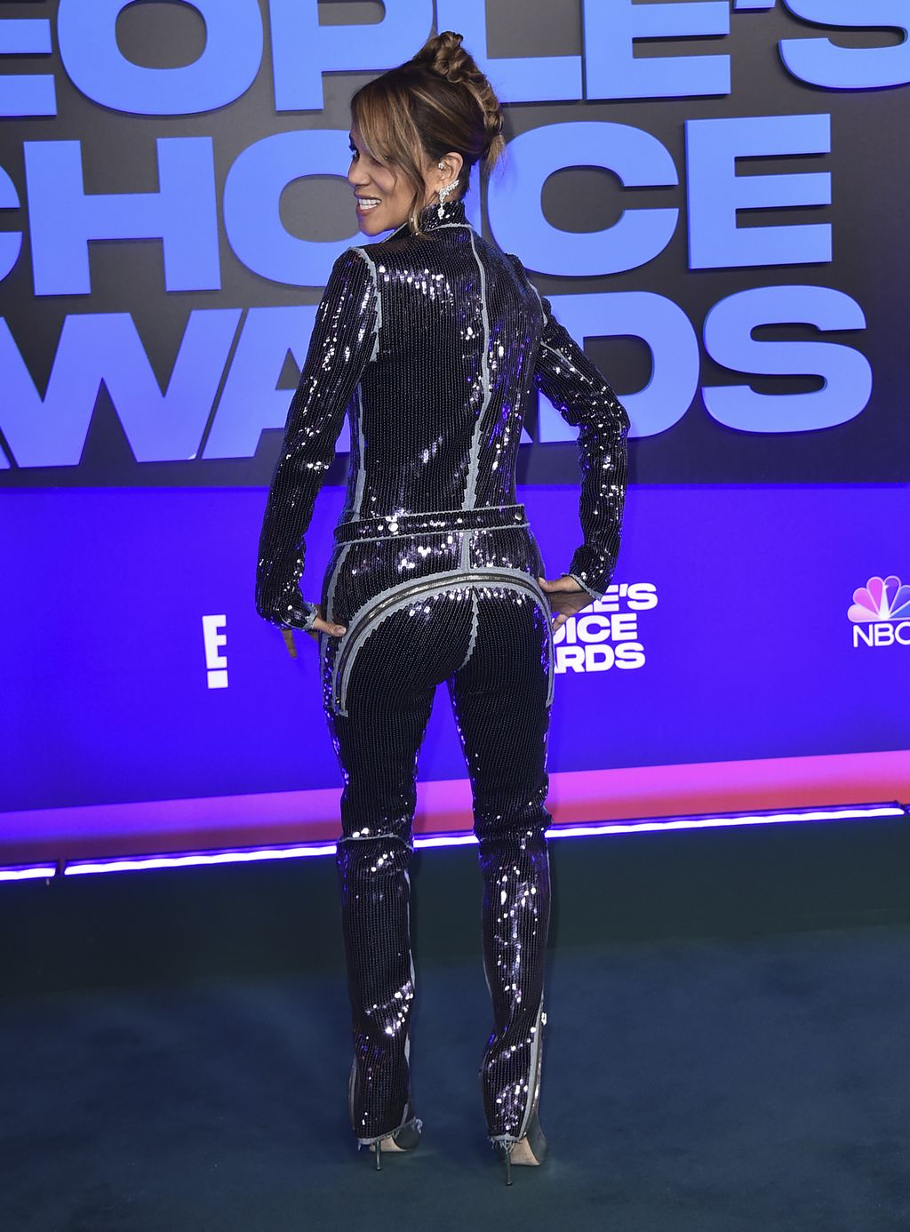 Halle Berry arrives at the People's Choice Awards on Tuesday, Dec. 7, 2021, at the Barker Hangar in Santa Monica, Calif. (Photo by Jordan Strauss/Invision/AP)