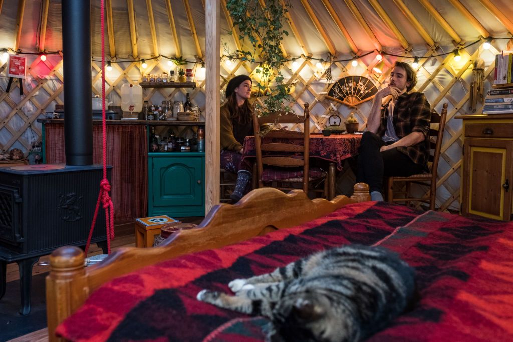 RIEL, NETHERLANDS - DECEMBER 21: Chris Heijmans and her husband Rick de Vries drink tea in their yurt on December 21, 2020 in Riel, Netherlands. Chris decided to sell her house during the pandemic and live tiny in a yurt to reduce on cost and have a free lifestyle. (Photo by Sanne Derks/Getty Images)
